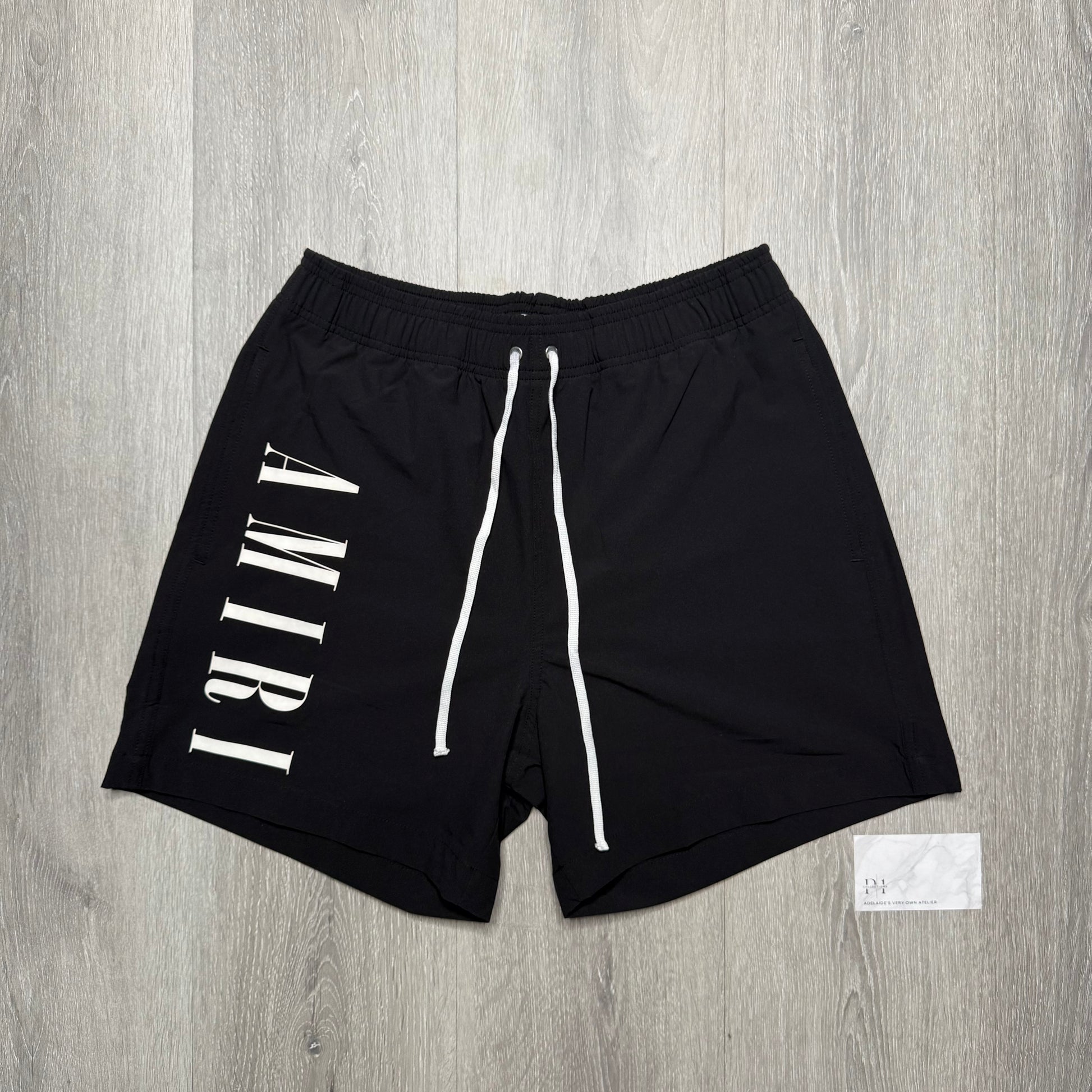 Amiri Vertical Logo Printed Swim Shorts - Black/White