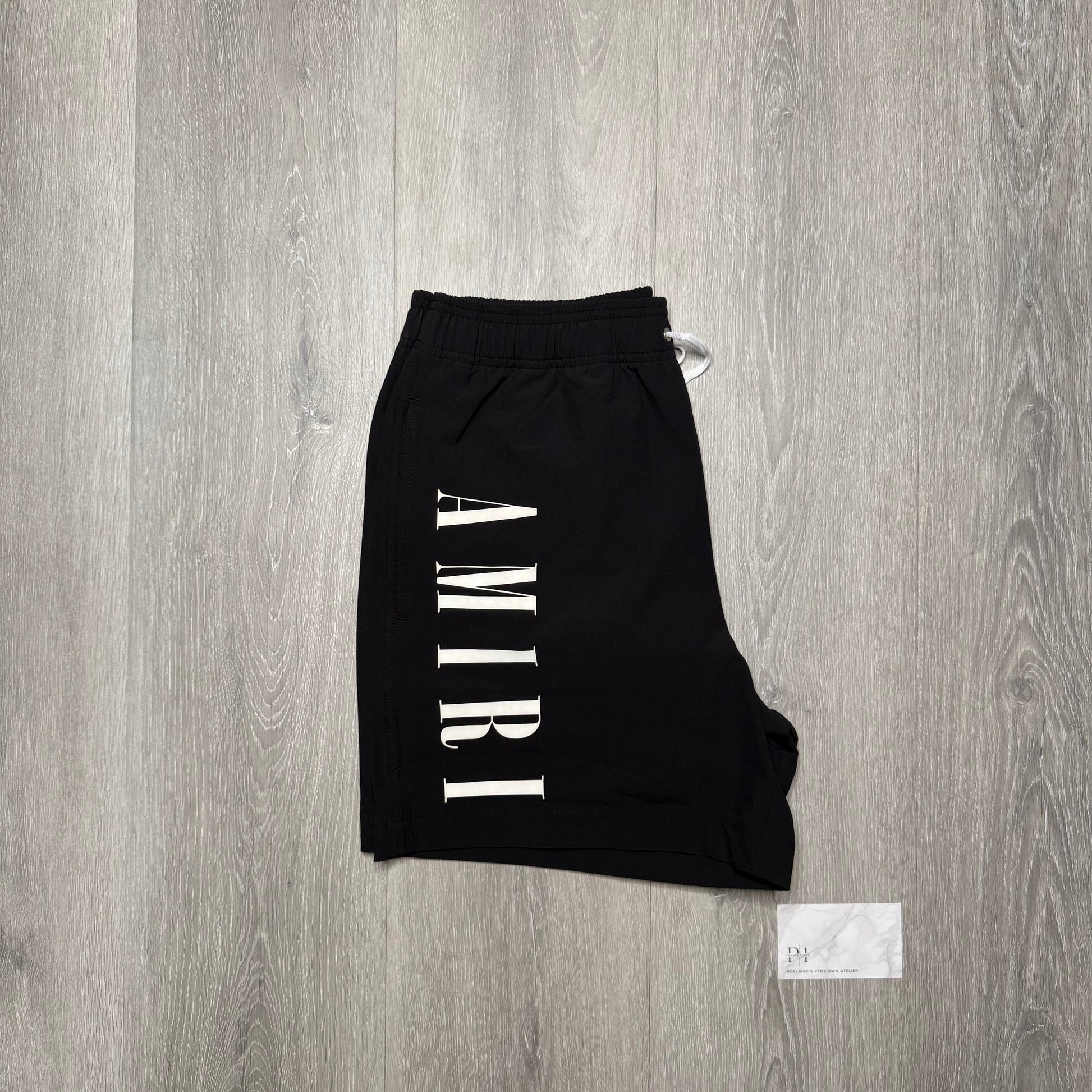 Amiri Vertical Logo Printed Swim Shorts - Black/White