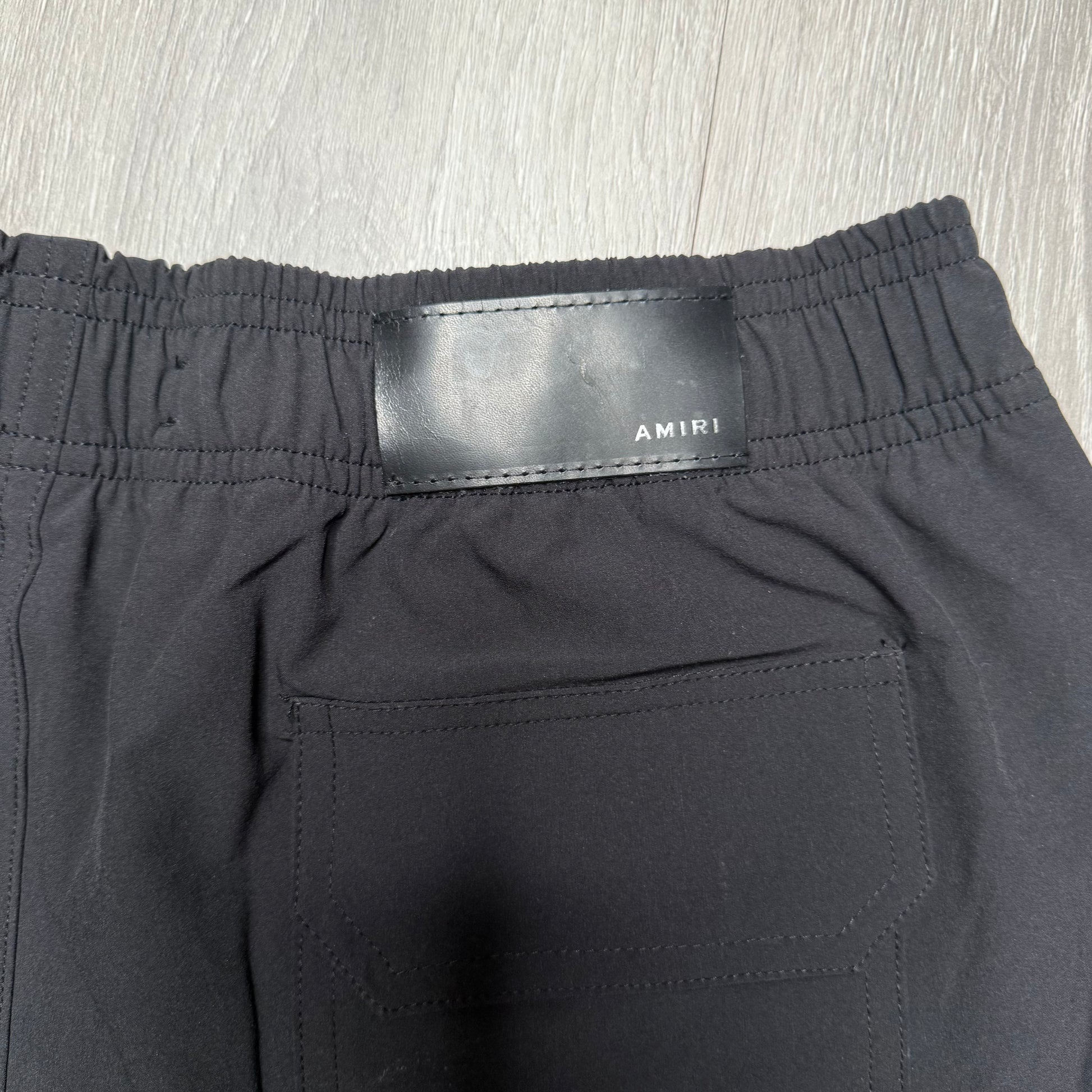 Amiri Vertical Logo Printed Swim Shorts - Black/White