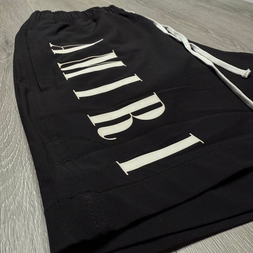 Amiri Vertical Logo Printed Swim Shorts - Black/White